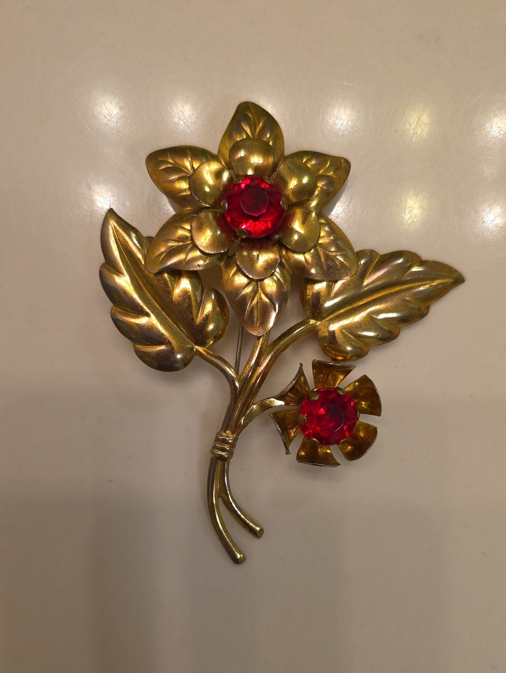 Gold Tone Floral Brooch with Red Gem Centers